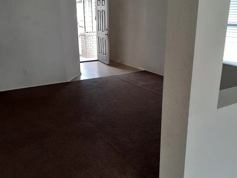 From dining area to living room to front door