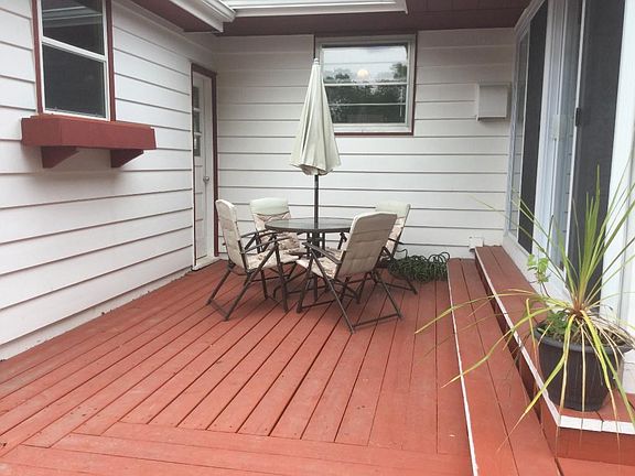 Enjoy a back porch outside to drink your morning coffee and listen to the birds.