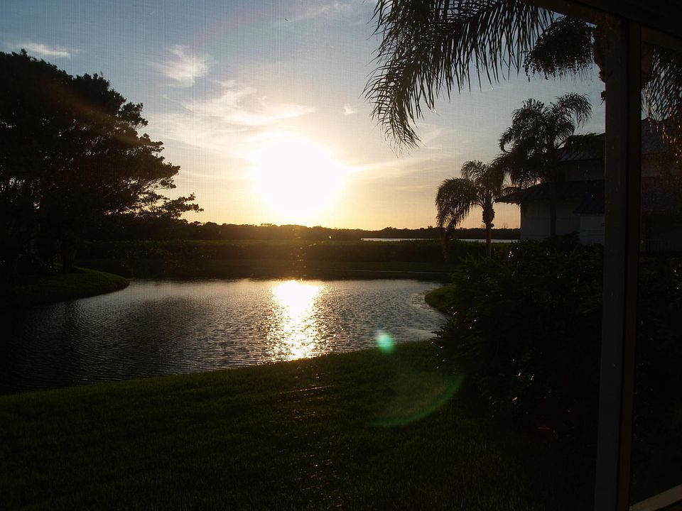 This is the sunset view from the condo dining room, living room, screened in porch and master bedroom. There are full length mirrors in the dining room that reflect this great view.