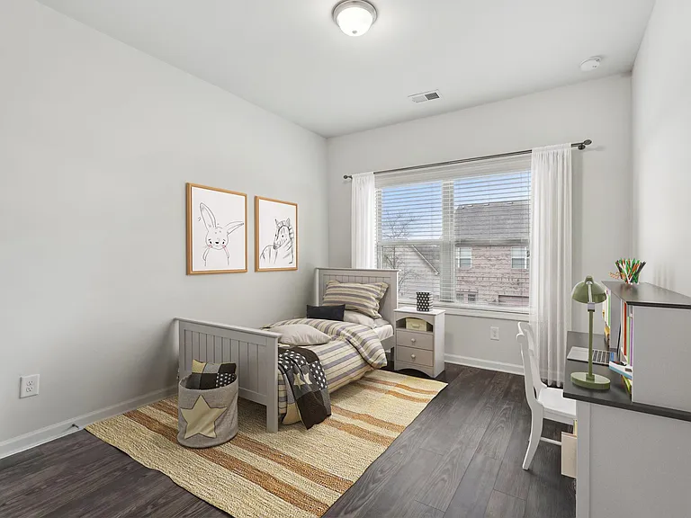 Another bedroom suite perfect for guest with natural light.