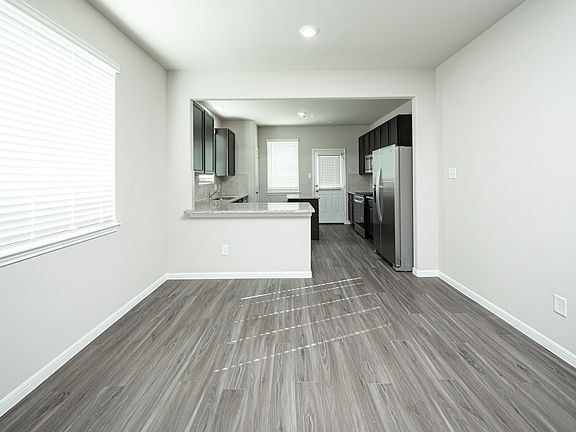 Family Room to Kitchen and Dining Area