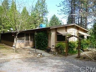 Back of home and screened-in porch