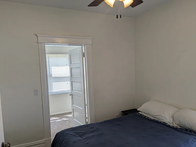 Bedroom 1 and door to Sunroom
(Queen bed not included)