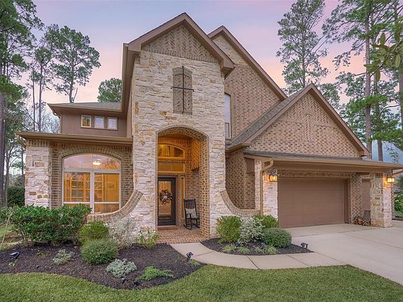 A roomy 3-car garage (with epoxy floors) and plenty of parking space in the driveway.