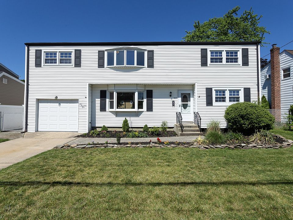 Front View & Attached Garage