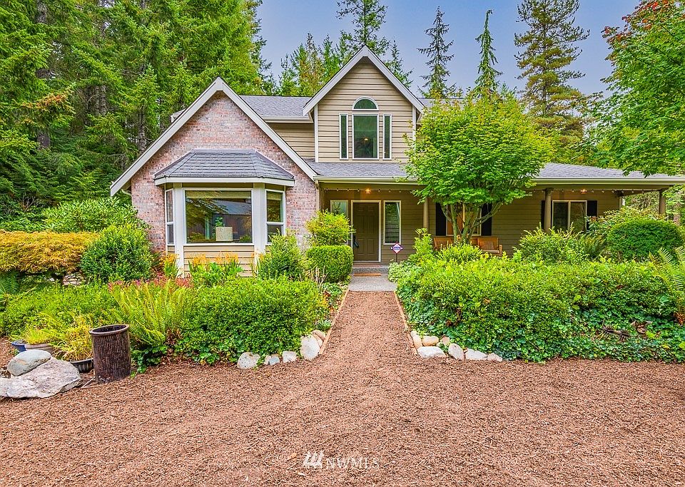 6574 Schuett Lane NW - Bremerton.  Brick N' Cedar exterior with four bay windows!