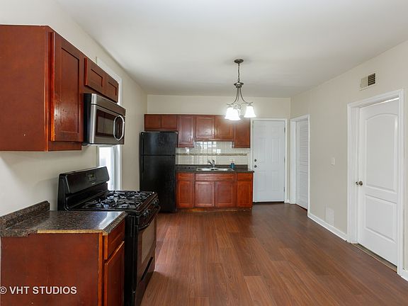 2nd image of 9369 S Burnside Ave