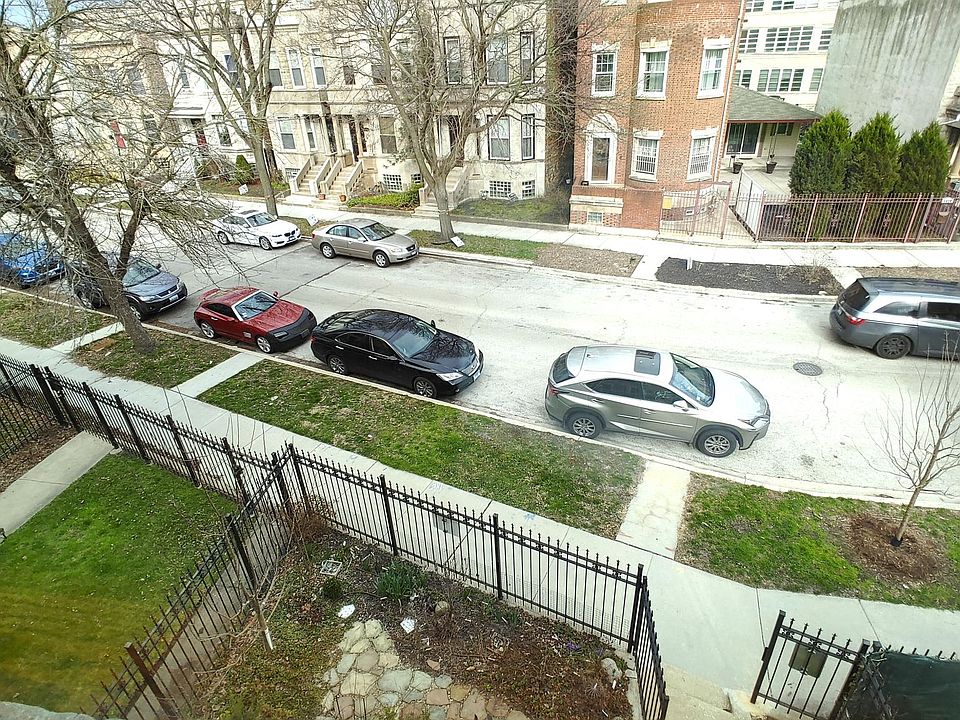 Part of garden that blooms continuously in summer from living room picture window view.