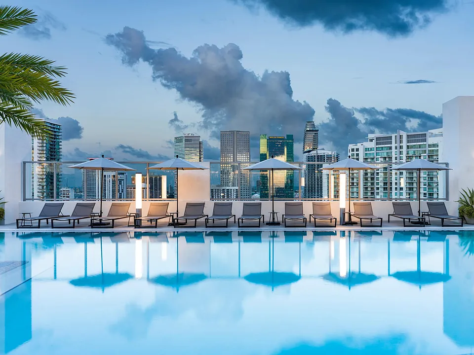 Take in breathtaking Miami skyline views from Modera Riverside's rooftop pool deck.