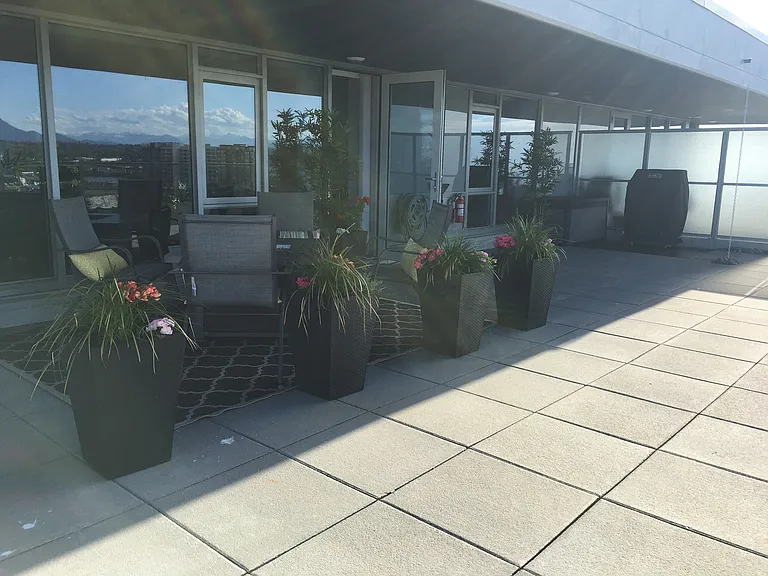 Terrace with sitting area and fire pit.