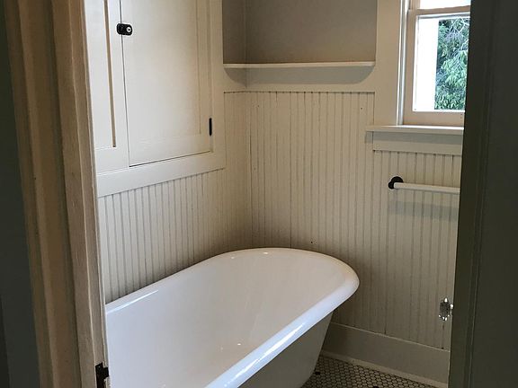 Refurbished clawfoot tub and will have shower surround