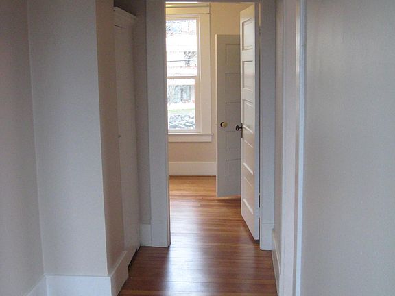 Second floor hallway leading to 2 of 3 bedrooms