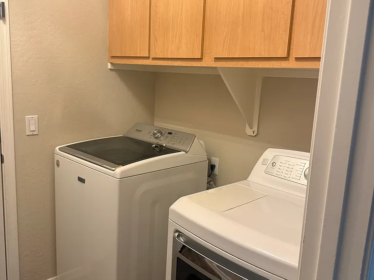 Laundry room attached w/ 2-car garage access (right wing of house)