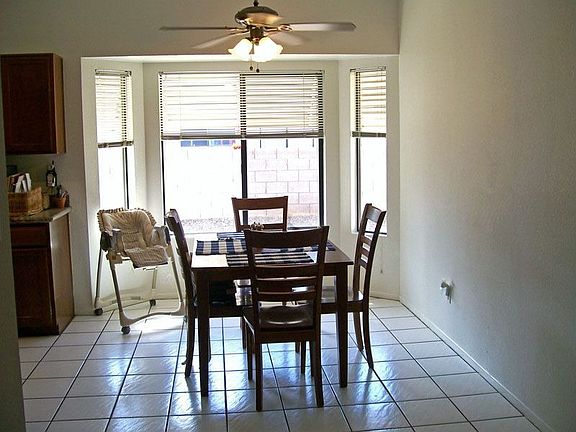 Dining w/bay window, hardwired fans, tile.