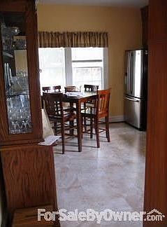 Kitchen Main unit
						:
						New stainless fridge, laminate floor, dish washer and counter.Orig Western Holly