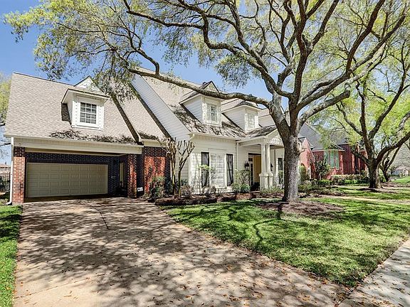 Beautiful tree lined street in one of the first custom neighborhoods in First Colony.