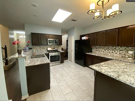 Upgraded Kitchen with Marble countertops and new back splash