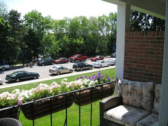 Balcony furniture loveseat and view looking southeast.