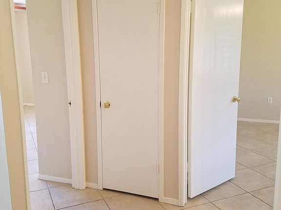 2 bedrooms with large storage closet between them.
