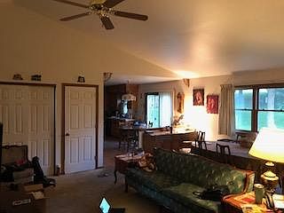 living room looking into the kitchen; my parents split the room in two and had a dining room table also in the living room.