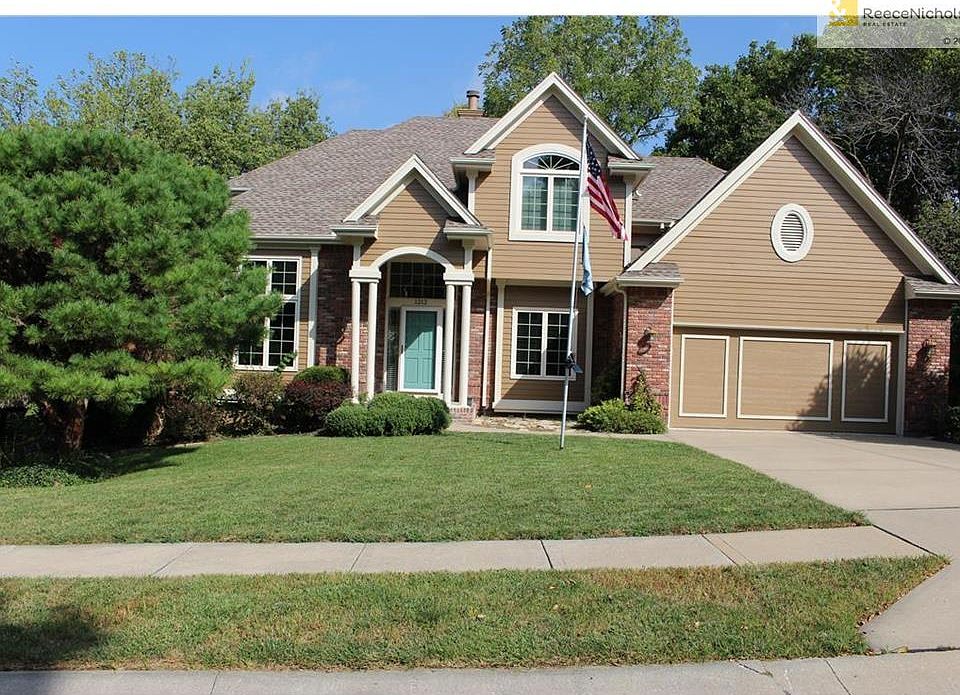 outside of house. cul-de-sac living with a private backyard