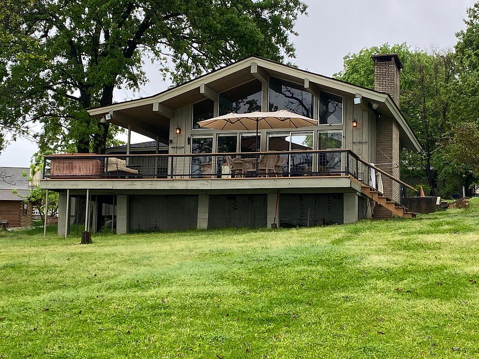 Lakefront balcony with new railing.