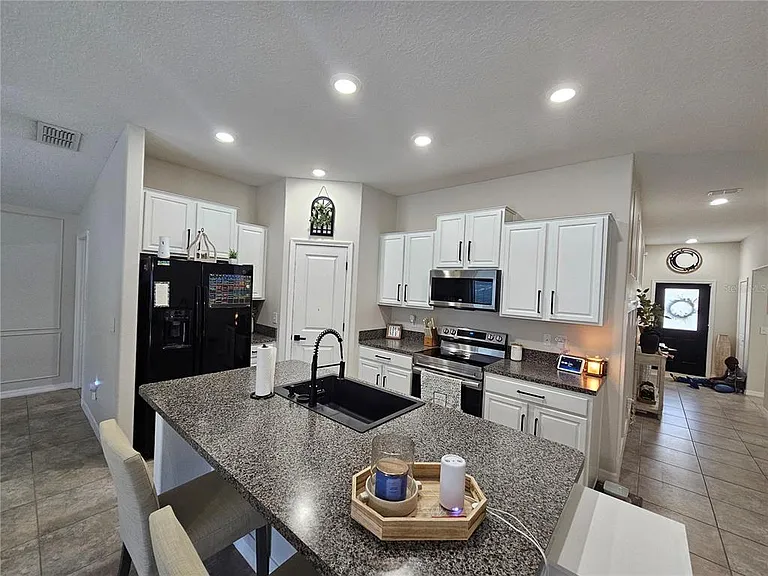 10005 Rose Petal Pl — Photo 13