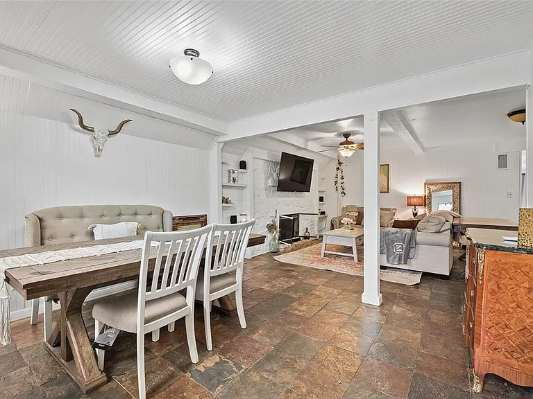 View of dining room and living room front door