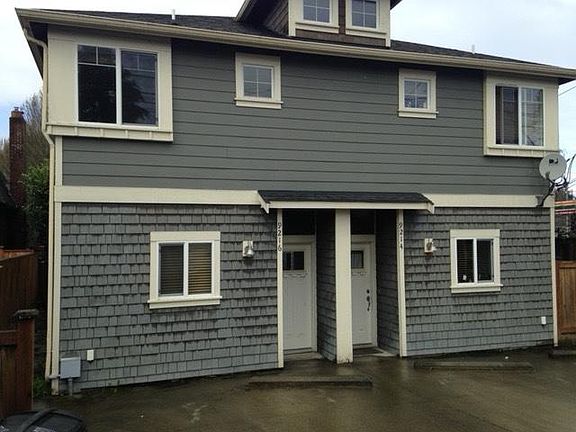 Parking spot included (1) off of the alley. Alley entrance makes it easy and safe for carrying groceries inside.