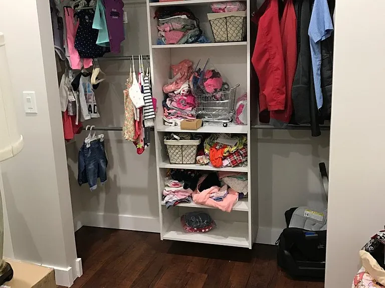 Bedroom closets feature custom built-ins