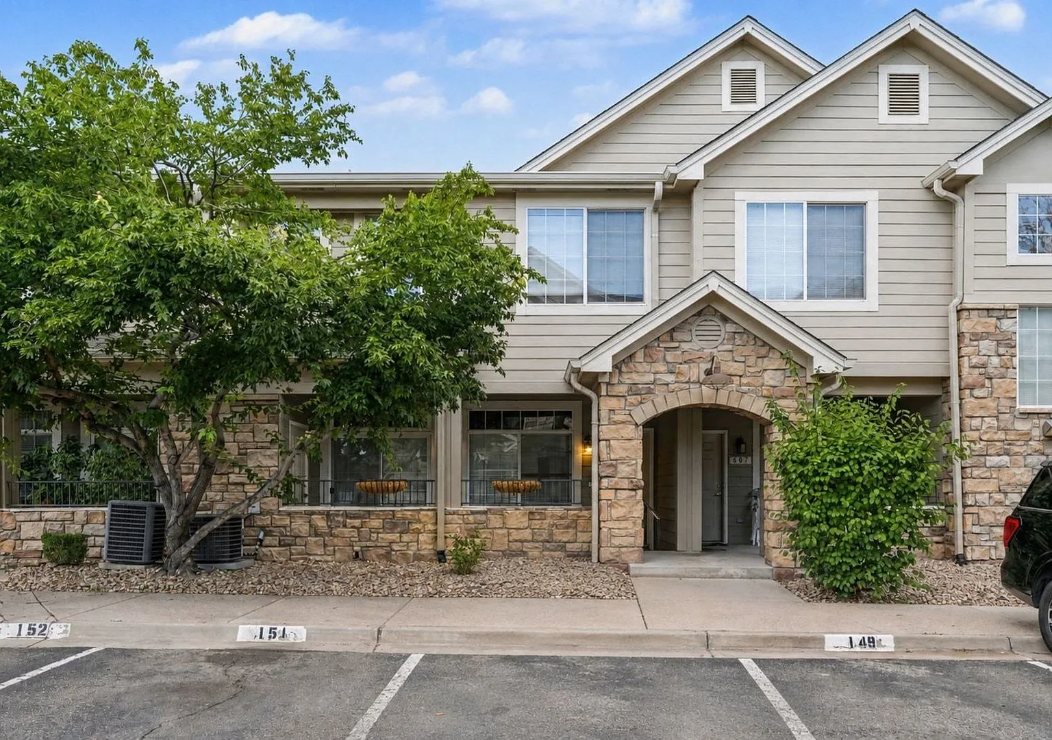 Spacious 2BR/2BA Aurora Condo | Garage, Community Pool & In-Unit Laundry — Photo 2