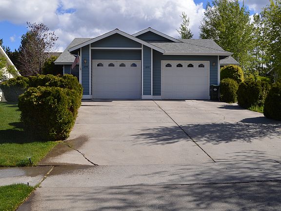 Driveway and Single Car Garage on Left