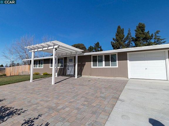 Front of House with 2-car garage
