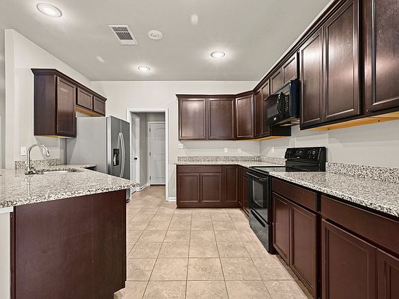 5th image of 15339 Mossystone Dr