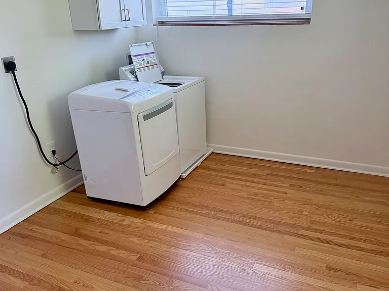 3rd bedroom or main floor laundry and office area