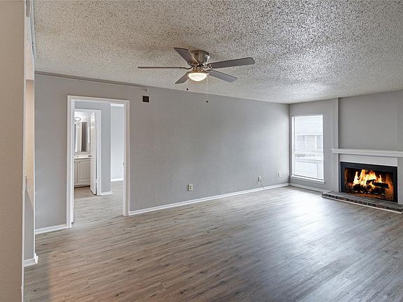 ANOTHER VIEW OF THE LIVING ROOM