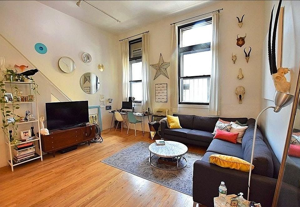 1st image of 117 E 11th St APT 1B
