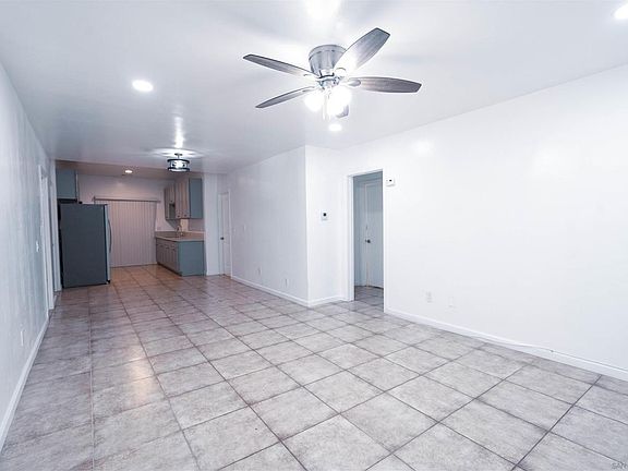 Living room and kitchen in the back