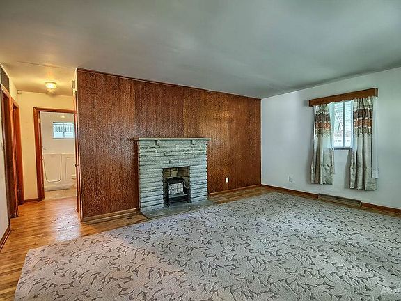 Living Room with stone gas fireplace