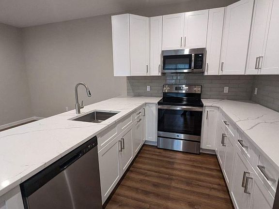 Townhouse White Stone Counters Featured in Apt# 102, #104 & #106