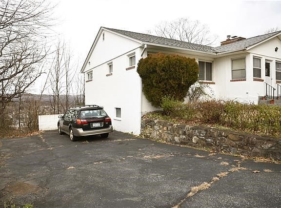 Driveway with room to park two cars.