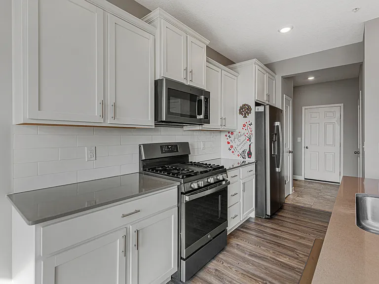 7285 Alvarado Ln N — Photo 12