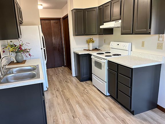 Kitchen with new countertops, updated cabinets and brand new dishwasher