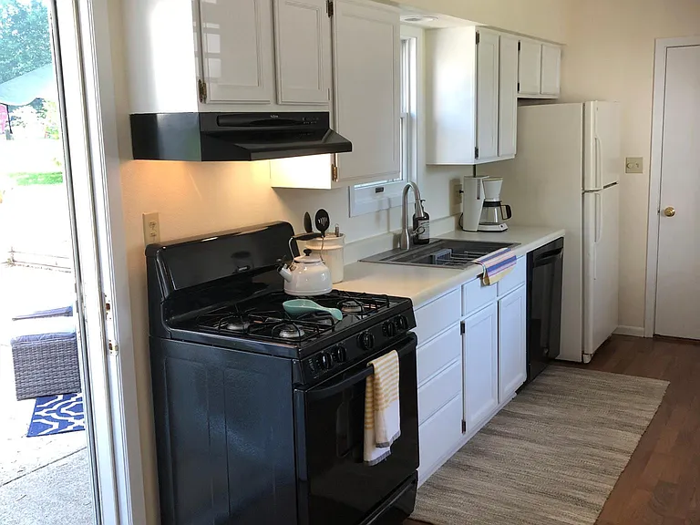Kitchen: includes all major appliances, utensils, china, glassware, cooking supplies, etc. There is a pantry, and see garage access for washer/dryer.