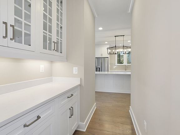 Butler s pass with built-ins, glass above