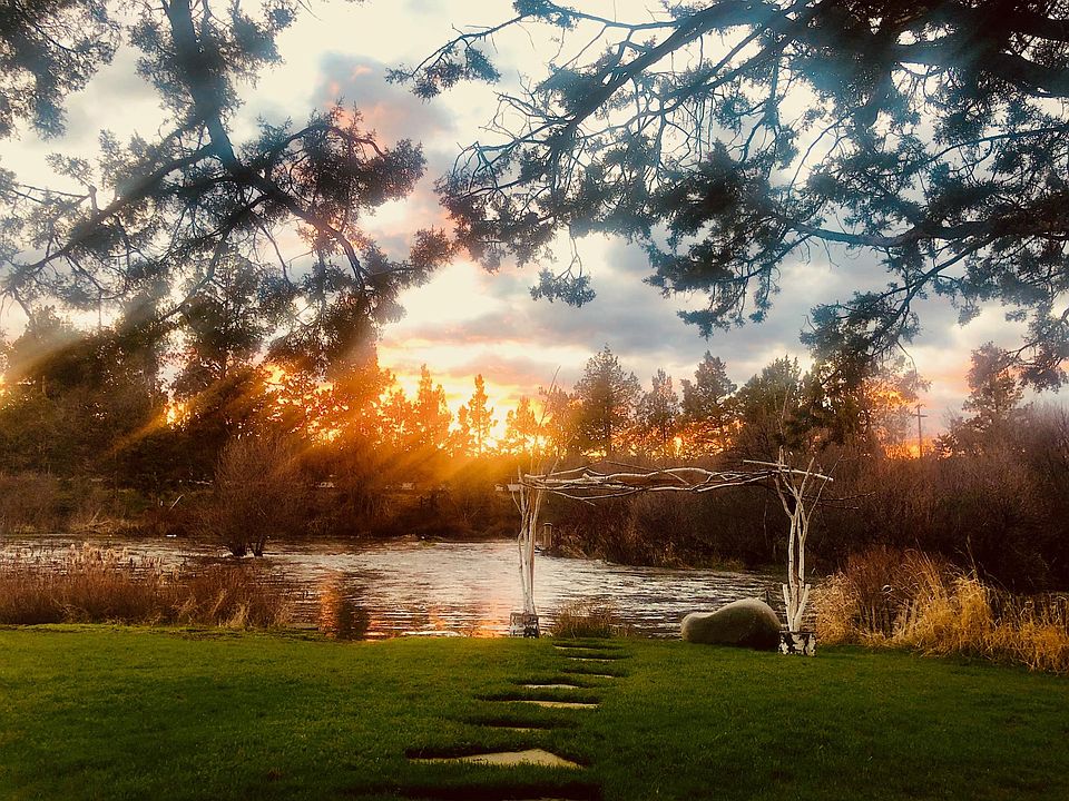 Sunset in the back yard and a favorite sitting rock. Great spot for listening to the river and having coffee!