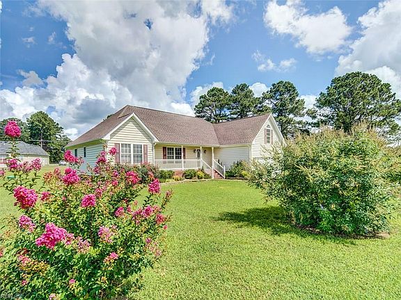 You will enjoy the landscaping with butterfly bushes and knock out roses