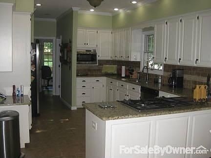 Kitchen
						:
						Recently remodeled with granite countertops and stainless appliances.