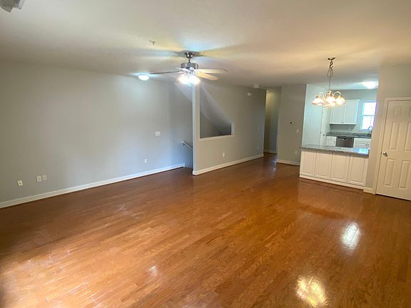Hardwood floors on main level, granite countertops, stainless appliances.