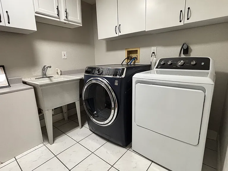 Wash room with private washer and dryer units